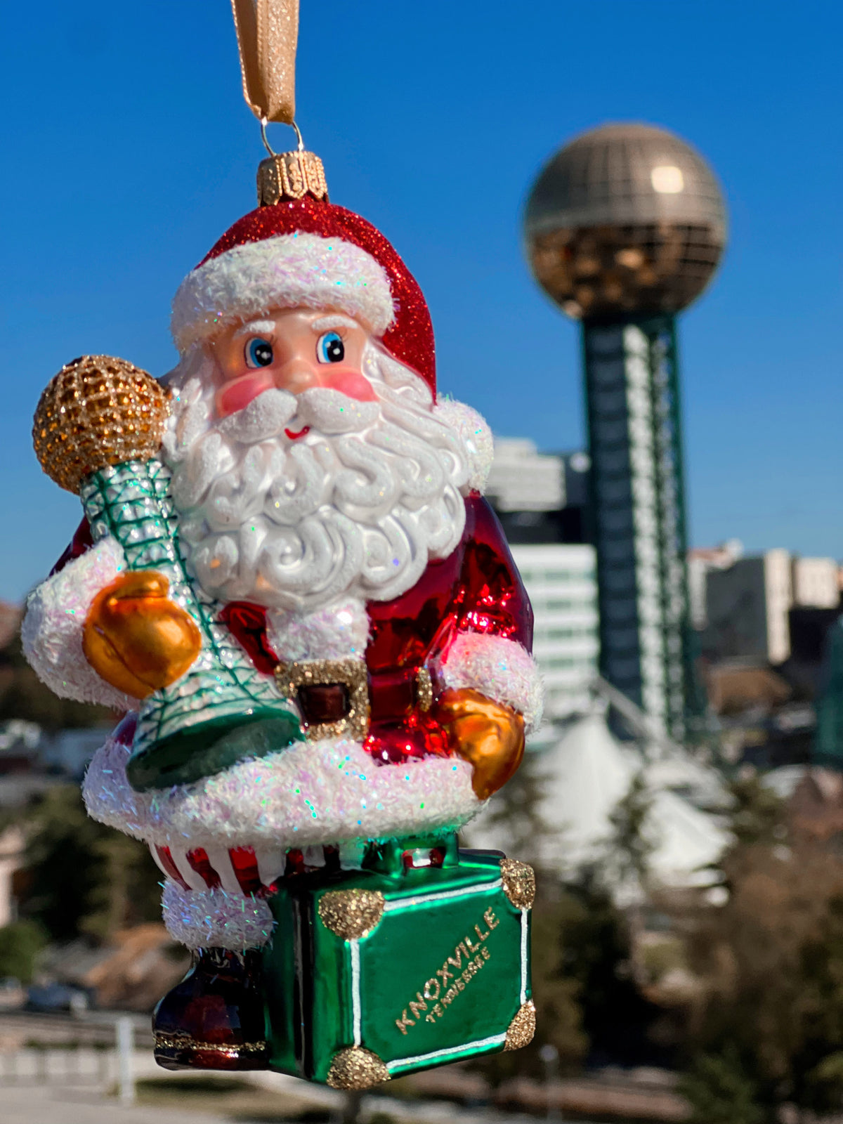 Santa Sunsphere ornament with the Sunsphere in the background
