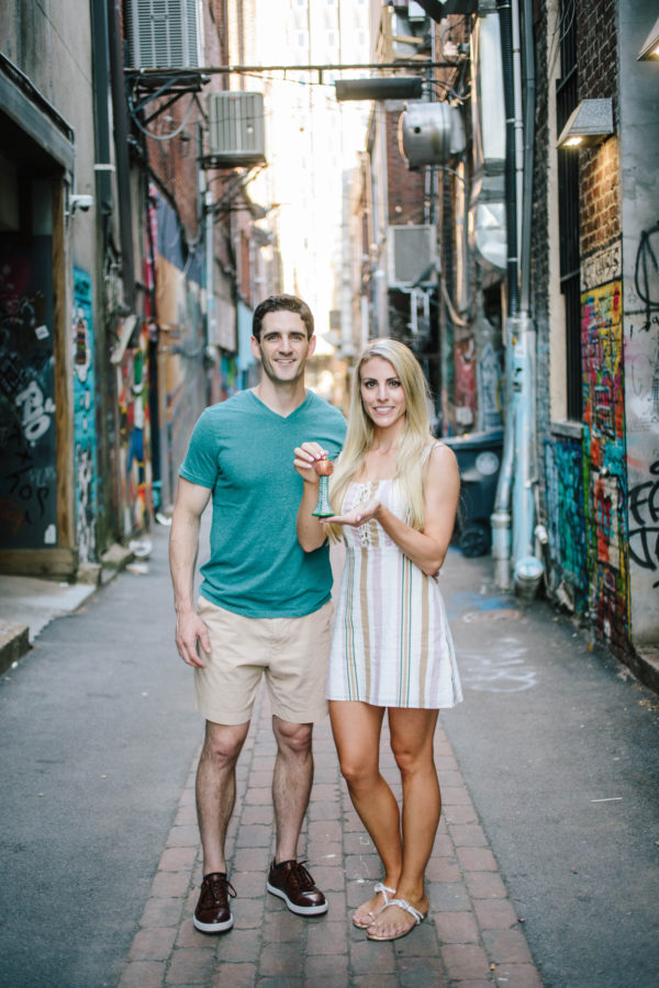 Guinn Boyce and Derek Boyce in Strong Alley with Sunsphere Ornament