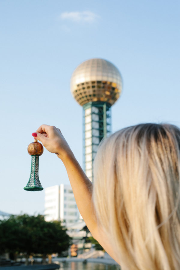 Guinn Boyce dangling the Sunsphere ornament